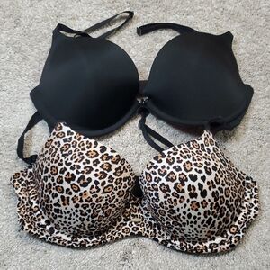 2 Victorias Secret Bras. 1 Blk And           1 Leopard Print. Both 32D